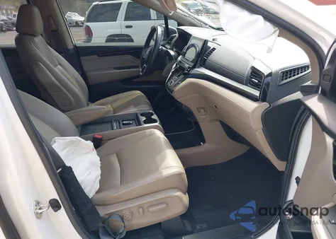 2021 Honda Odyssey Touring z USA, uszkodzony, nr VIN 5FNRL6H80MB010952